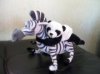 panda-baby-riding-a-zebra-ausra-paul.jpg
